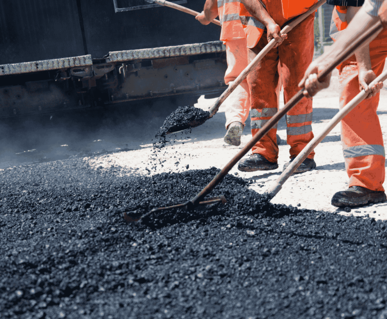 Professional paving contractor working on a driveway in Texas